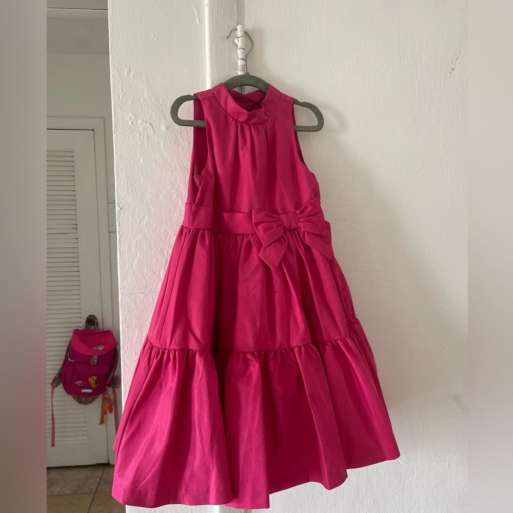 Hot pink dress.